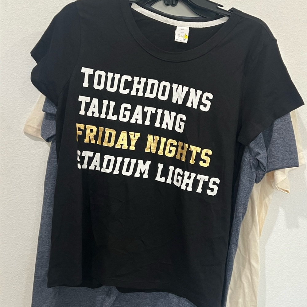 Bundle:Three T shirts (one price)
Black Tee with Gold and White Print
